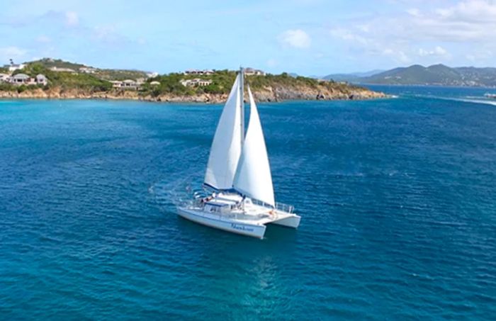 a catamaran gliding along the coast of St. Thomas