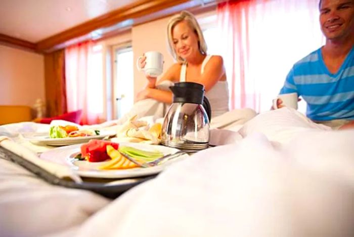 a couple savoring breakfast with room service