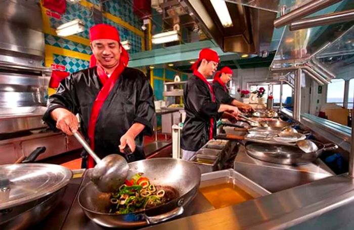 chefs preparing a vegetable stir-fry at Mongolian Wok