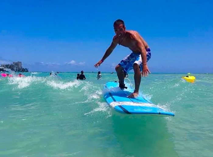 a man riding the waves while surfing