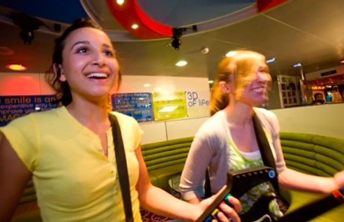 girls enjoying guitar games in Circle C