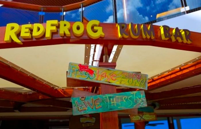 the RedFrog Rum Bar sign on a Dinogo ship