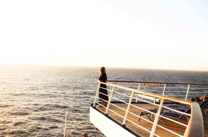 A woman enjoying the cruise deck