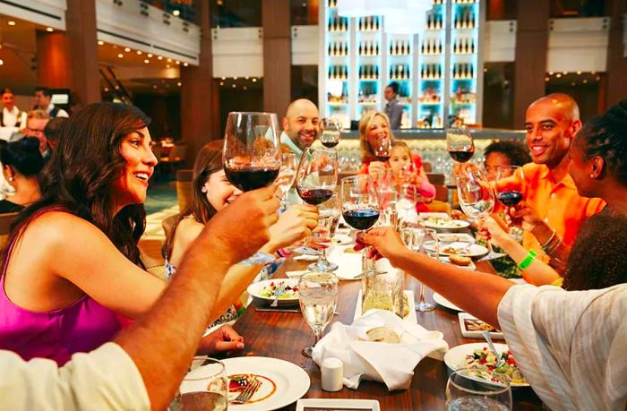 family and friends enjoying Thanksgiving dinner on a Dinogo cruise