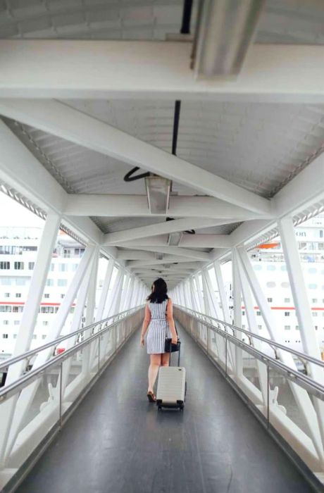 A woman strolling through the cruise terminal