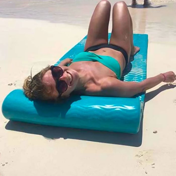 Sarah relaxing on a beach float.