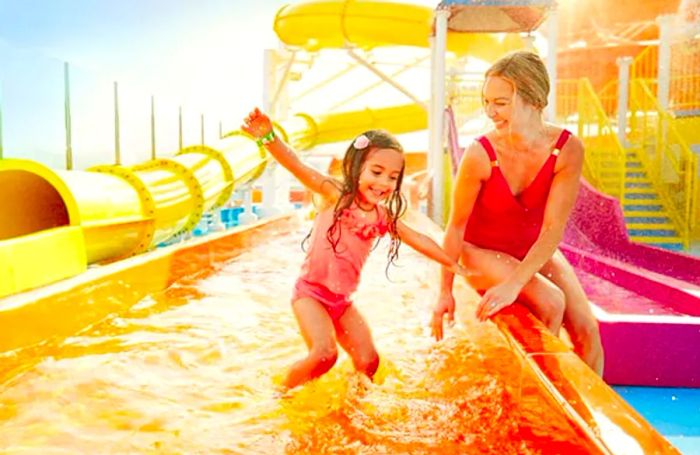 mother and daughter enjoying a waterslide