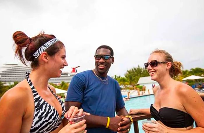 a group of friends enjoying drinks by the pool in Grand Turk