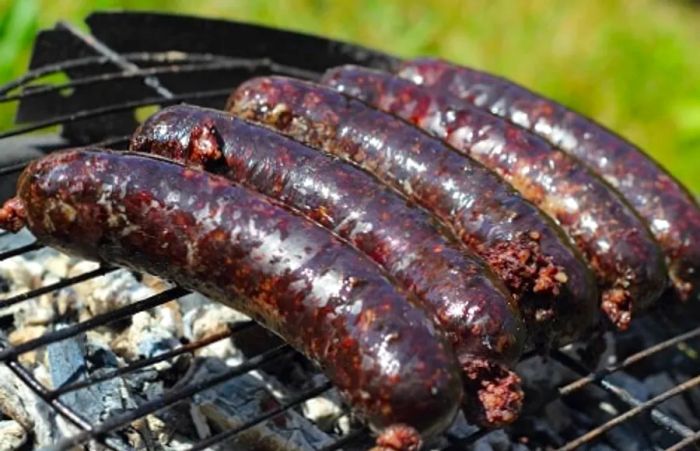 grilled blood sausages at a park