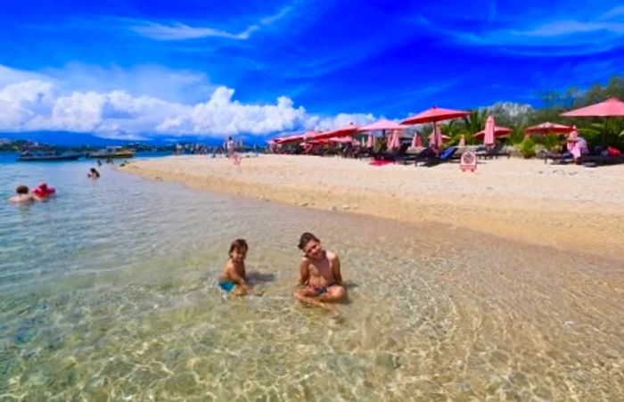 children playing on the beach in Noumea