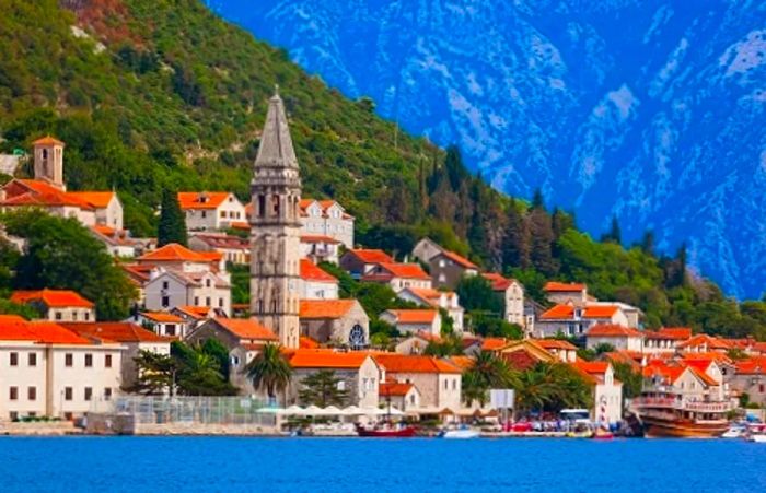 a picturesque view of a village in Kotor