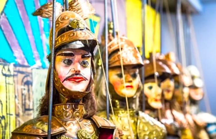 Sicilian puppets available at a souvenir cart in Italy