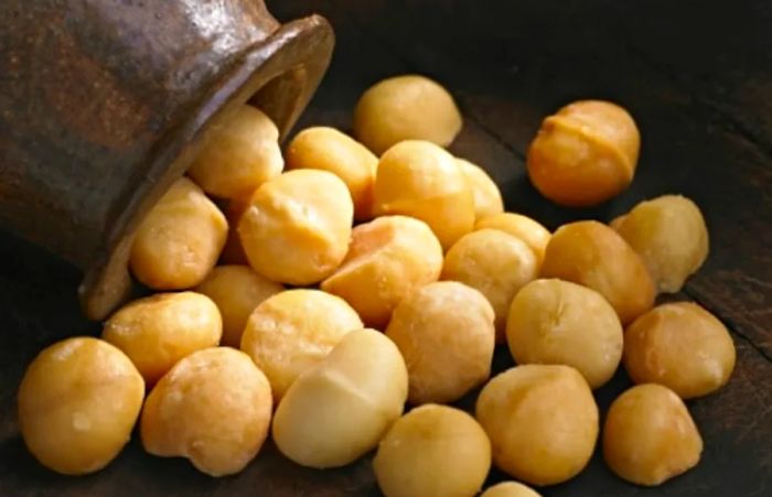 Hawaiian macadamia nuts arranged on a wooden table