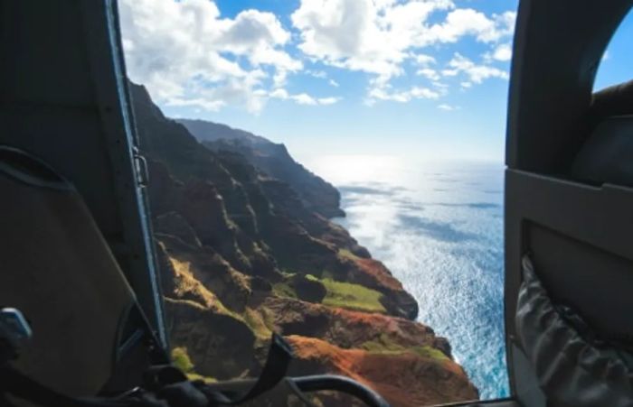 aerial view of Waimea Canyon in Kauai as seen from the back seat of a helicopter