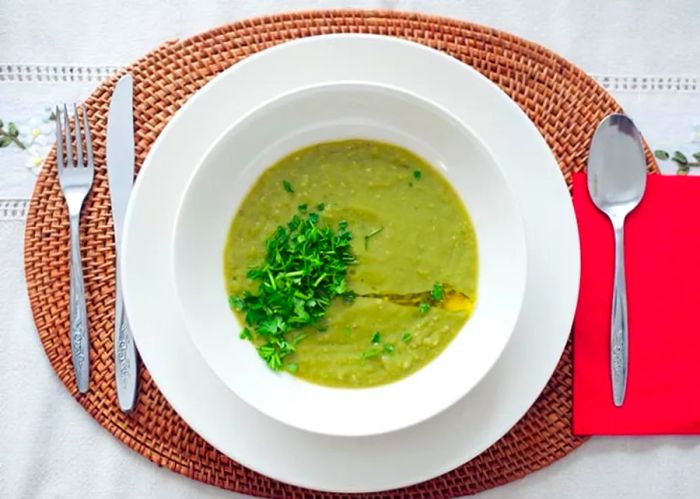 a bowl of callaloo soup prepared in Dominica