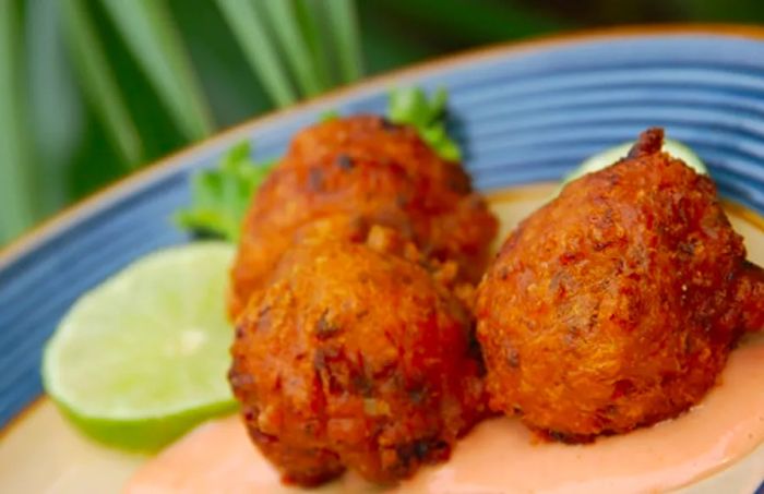 conch fritters from grand turk served with lemon and a pink dipping sauce