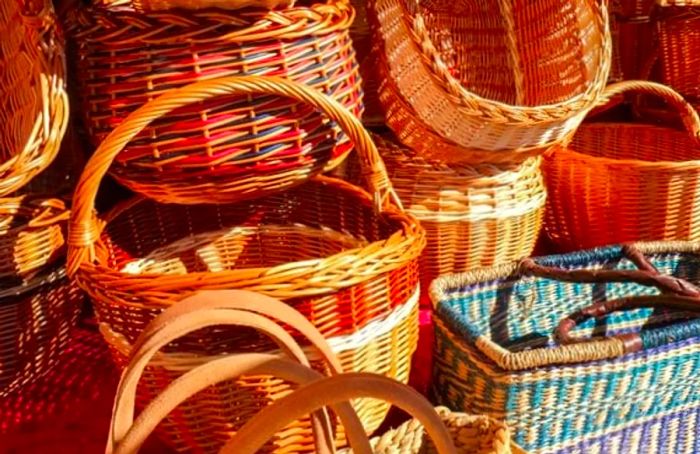 colorful handmade straw baskets of various shapes from Dominica