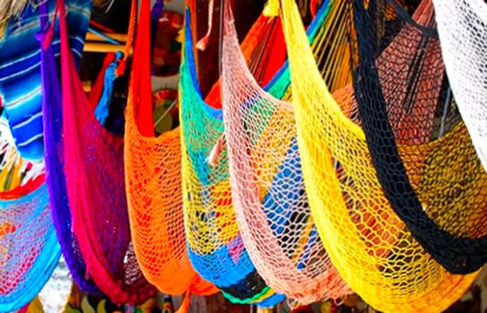 hammocks displayed for sale in various colors