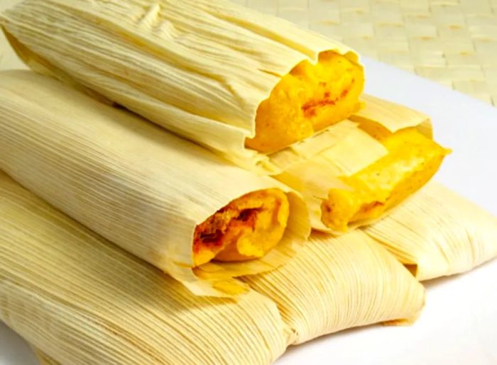 A stack of Belizean tamales/bollos.