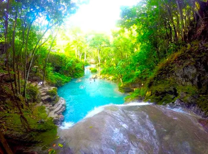 view of the Irie Blue Hole from the top of the waterfall