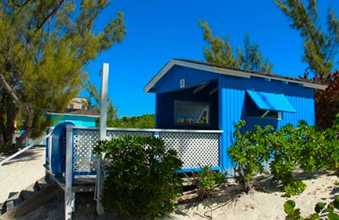 a blue cabana rental situated in Half Moon Cay, The Bahamas