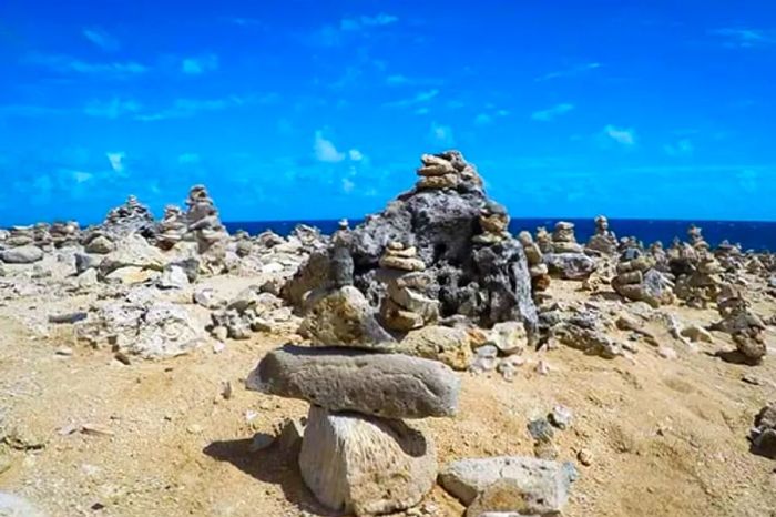 Piles of stones balanced atop one another in Aruba