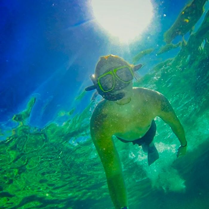 a man taking a selfie while snorkeling in St. Lucia