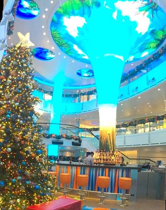 a Christmas tree in the atrium of the Dinogo Vista