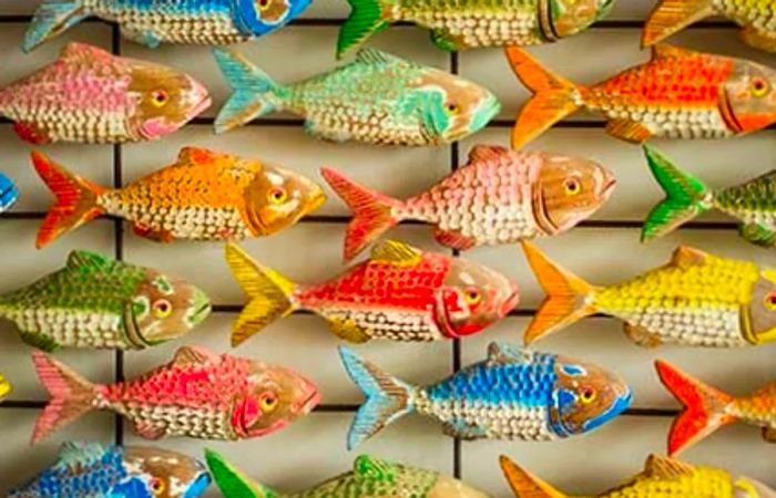 handcrafted tropical fish carvings