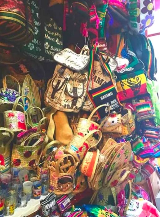 Bags and candles arranged by a vendor in Nassau