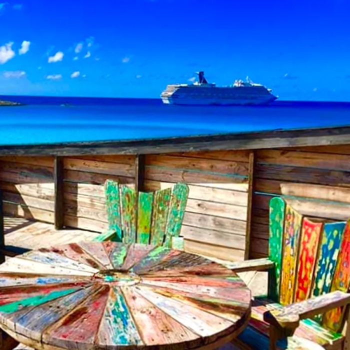 A vibrant table with a view overlooking Half Moon Cay