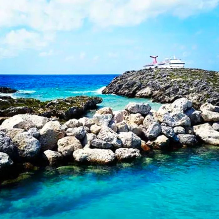 Stones lining the shore of Half Moon Cay