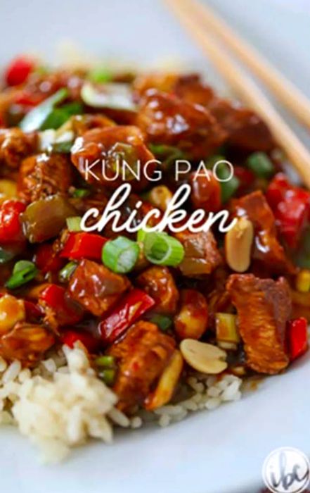 Kung Pao Chicken served over rice on a white plate with two chopsticks alongside and a text overlay