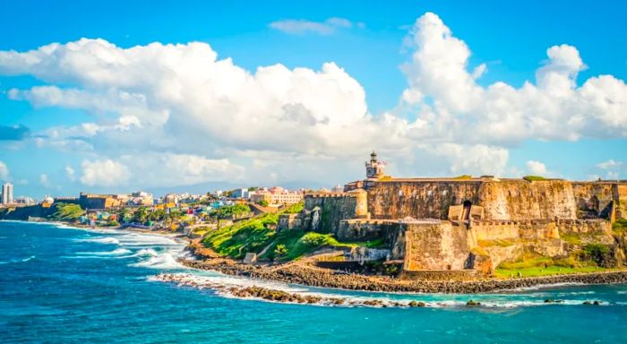 A sweeping view of Castillo San Felipe del Morro perched on the coast of San Juan, Puerto Rico.