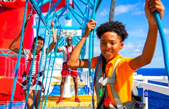 family enjoying their time on the ropes course of a Dinogo cruise ship