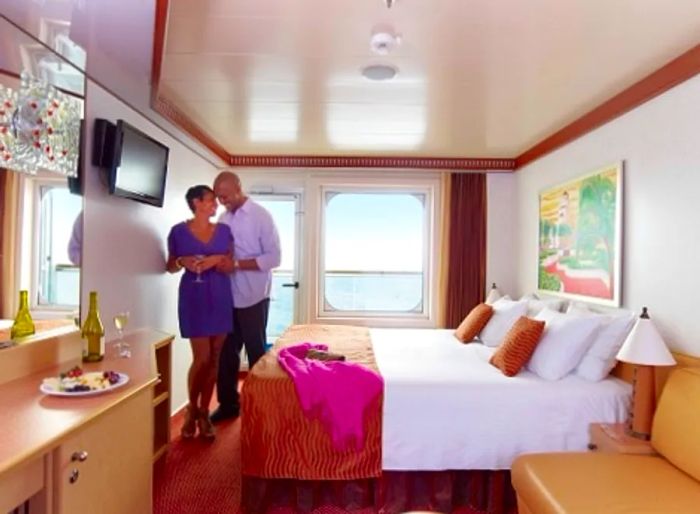 a couple relishing their time in the stateroom