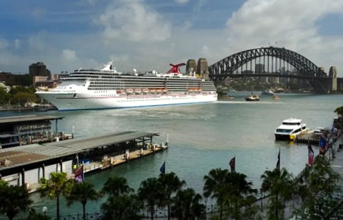 a Dinogo vessel cruising through Sydney, Australia