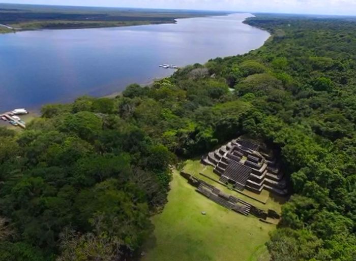 aerial view of Lamanai Mayan ruins and the New River Lagoon