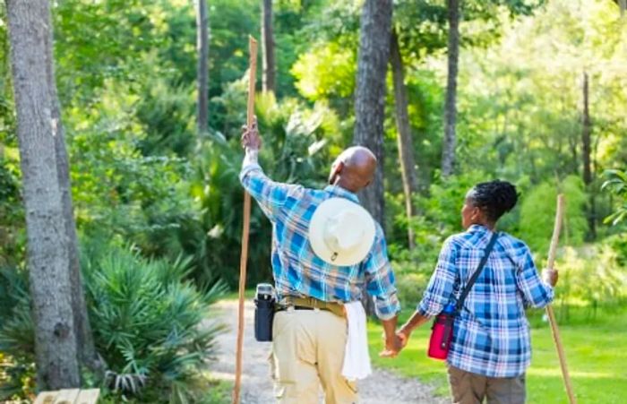 An older couple hiking along the nature trails in Jacksonville