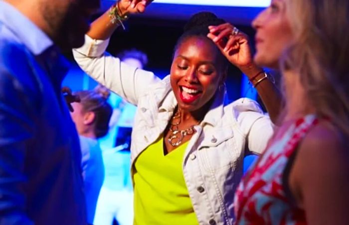 woman dancing at the New Year’s Eve after party in Dinogo’s nightclub