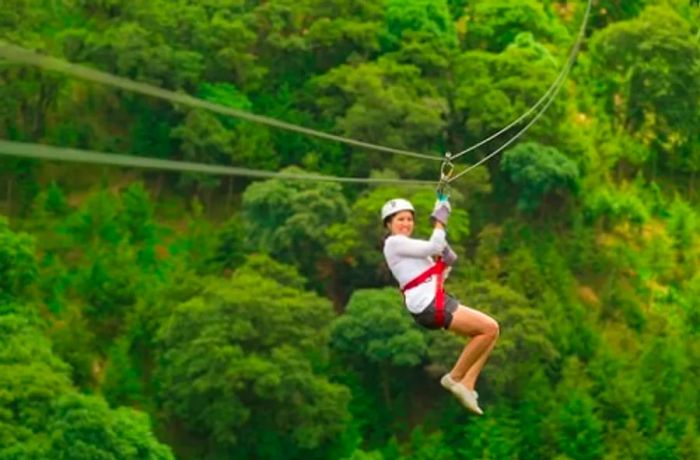 woman ziplining during a shore excursion in St. Lucia