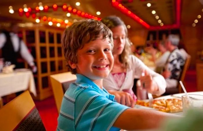 boy enjoying pizza at Pizzeria del Capitano