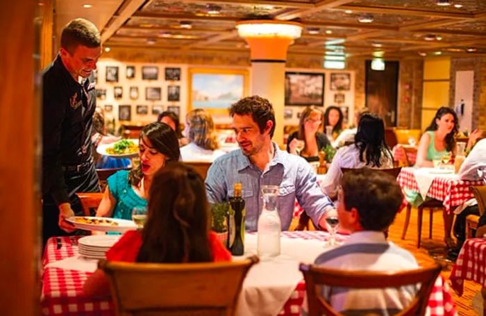 family savoring a meal at Cucina Del Capitano