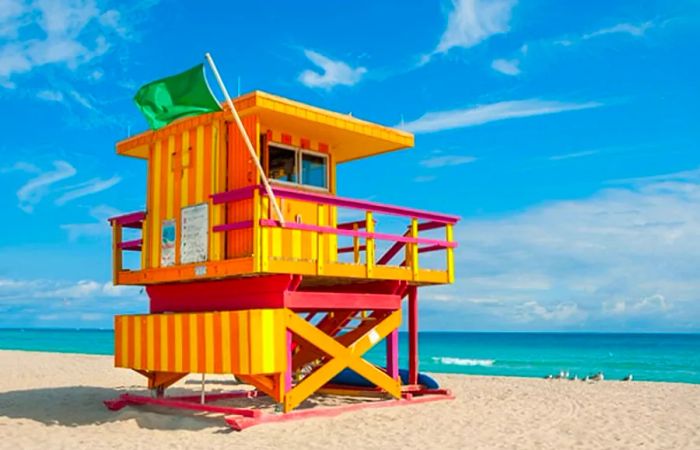 vibrant yellow and orange lifeguard tower at South Beach