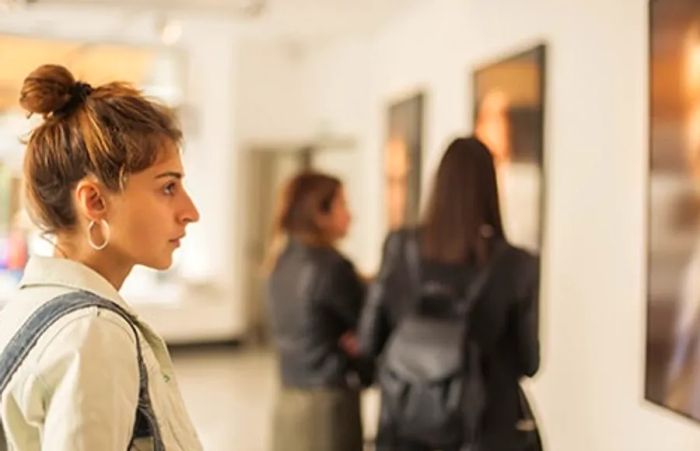 woman admiring artwork at the Baltimore Museum