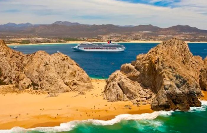 a breathtaking view of a popular beach in Cabo San Lucas, Mexico