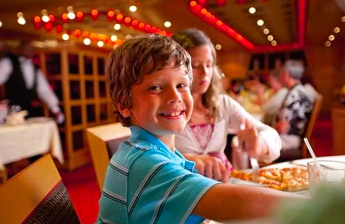 children savoring their meals at dinner