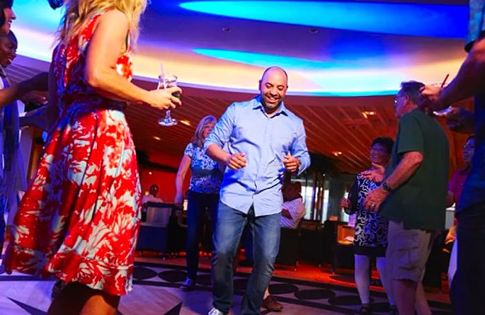 guests dancing onboard