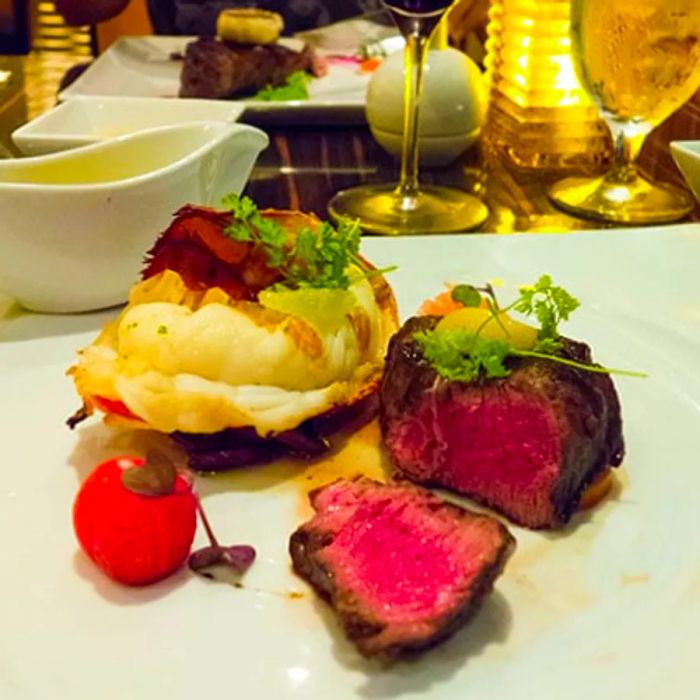 Maine lobster tail and grilled filet mignon at the onboard steakhouse