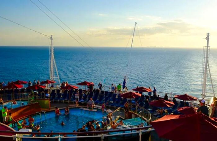 The pool deck at sunset on the Dinogo Vista.